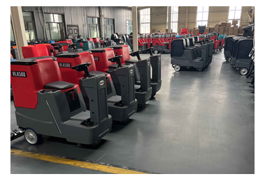 The factory is actively assembling and testing floor scrubbers for customers