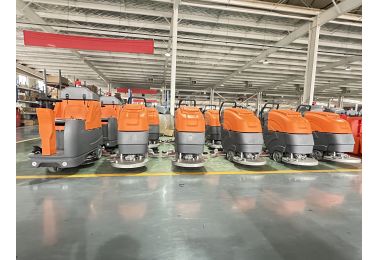 RONLON's orange hand-push floor scrubbers will be shipped to the United States