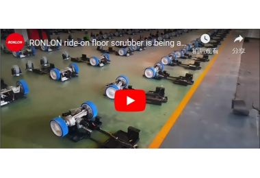 RONLON ride-on floor scrubber is being assembled